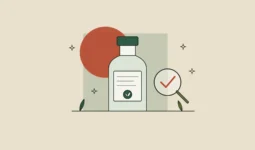 Frasco con etiqueta de ingredientes y una lupa con una marca de verificación: cómo leer la etiqueta de un cosmético