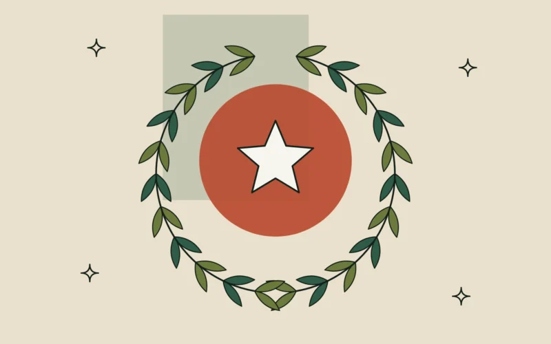 Corona de laurel con una estrella sobre un círculo terracota